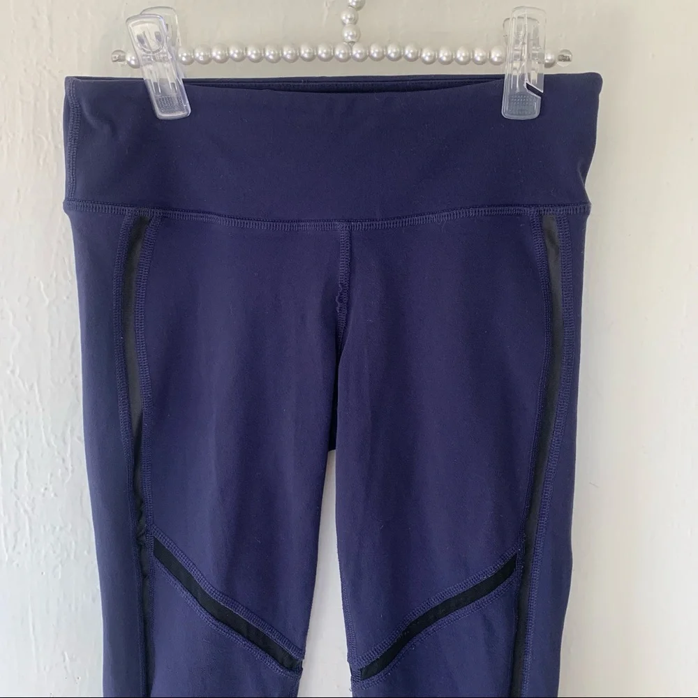 ALO Yoga Continuity Capri Legging In Rich Navy